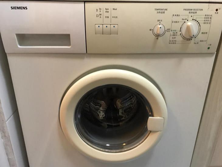 滚筒洗衣机洗完衣服门打不开的原因